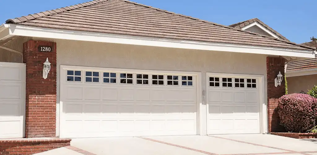 Residential garage door repair service for a double garage door in Orange, CA