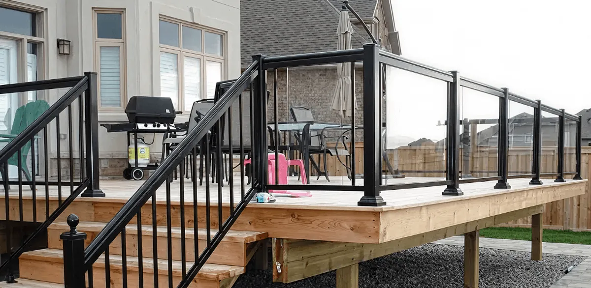 Handrail installation on a deck staircase for safety and code compliance in Orange, CA