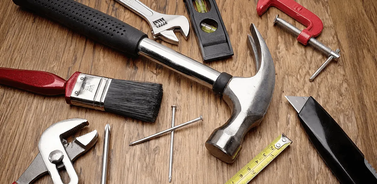 Handyman tools laid out for home repair and maintenance work in Orange, CA